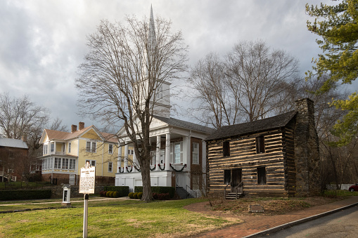 Jonesborough, Tennessee, USA - December 28, 2021: Log house of Christopher Taylor. Build in 1777. Jonesborough is the oldest town in Tennessee, founded in 1779, 17 years before it became a state.