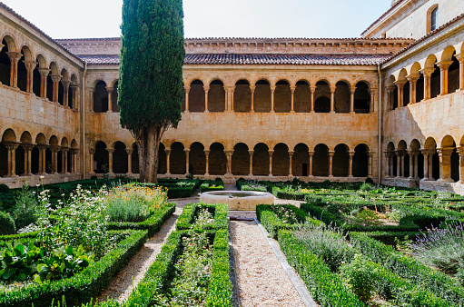 Green gardens in the courtyard of the monastery of Santo Domingo de Silos, Burgos, Castilla y León, Spain.