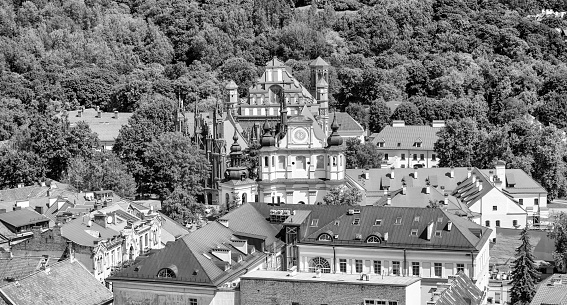Aerial view of Vilnius city landmarks in the moddle of trees, Lithuania