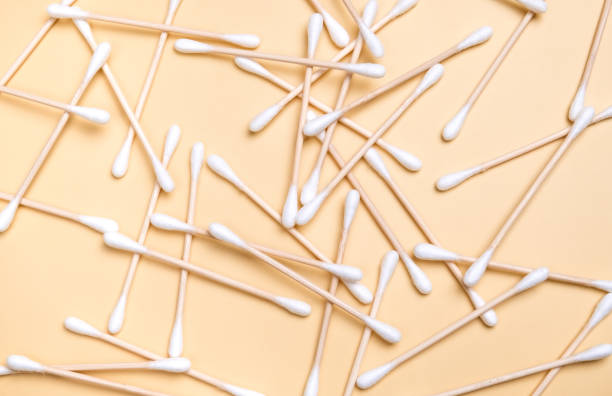 istock Bamboo cotton swabs crumble on a beige background. Hygiene cotton buds. Zero waste 1364294354
