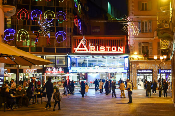 Exterior of the Ariston Theatre in the city center of Sanremo, famous for annually hosts the Italian Song Festival since 1977, Imperia, Liguria, Italy Sanremo, Imperia, Liguria, Italy - January 03 2022: The Ariston Theatre is one of the most famous cinema-theatre in Italy and hosts the Festival of Italian Song annually since 1977 san remo italy photos stock pictures, royalty-free photos & images