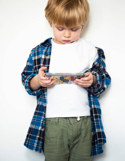 istock Little boy use smartphone 1364296247