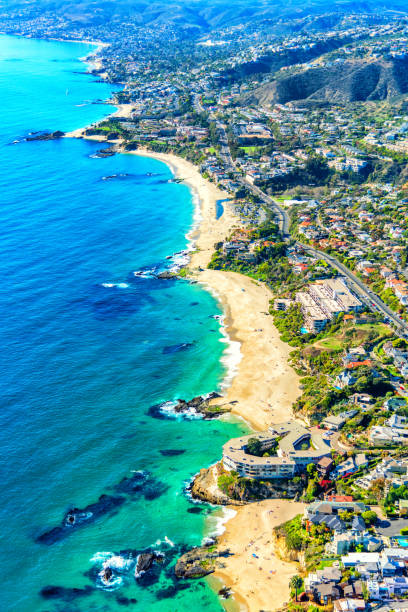 South Orange County California Coastal Aerial The coastline of southern Orange County, California including parts of South Laguna and Dana Point shot from an altitude of about 800 feet during a helicopter photo flight. dana point stock pictures, royalty-free photos & images
