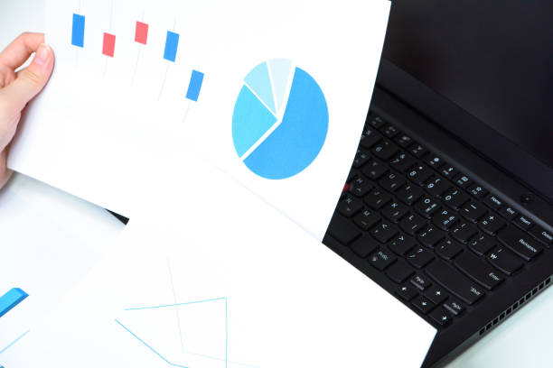istock An expert in suits who checks the document chart. 1364303524