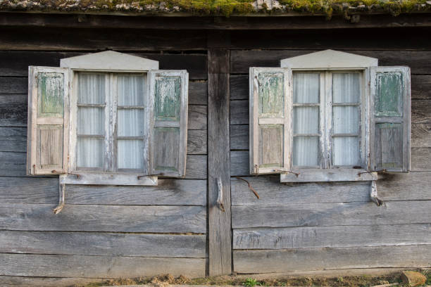 istock Old dirty window on old dirty wall. 1364305195