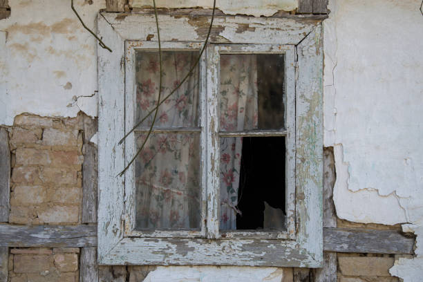istock Old dirty window on old dirty wall. 1364305294