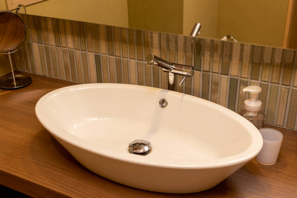 istock A modern washbasin with a horizontally long white sink 1364309247