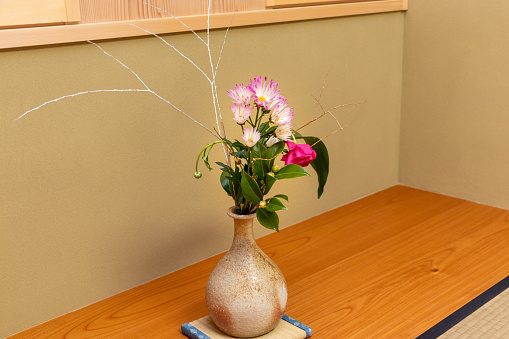 Japanese flower arrangement decorated on the wooden alcove