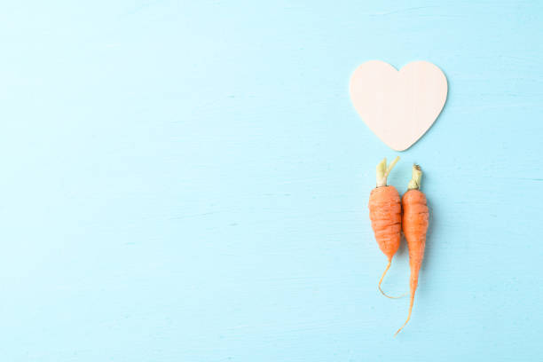 Couple organic carrot with heart shape, love concept, Valentine day