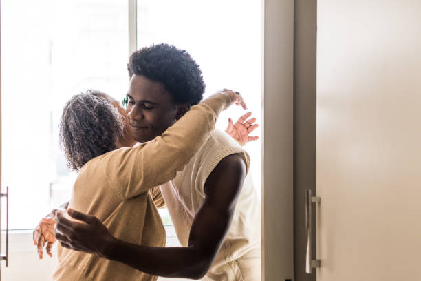 istock Grandmother and grandson hug each other 1364313639