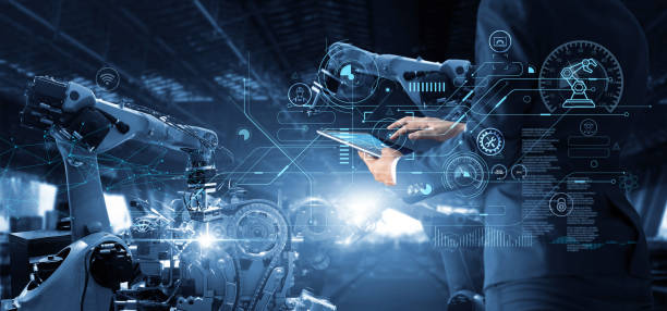 istock Manager Technical Industrial Engineer working and control robotics with monitoring system software and icon industry network connection on tablet. AI, Artificial Intelligence, Automation robot arm 1364316653