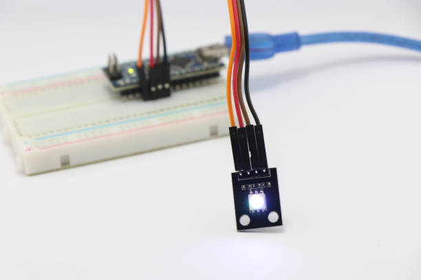 istock ARGB LED module connected to breadboard using jumper wires, Various electronic parts combined to make amazing science projects 1364316814