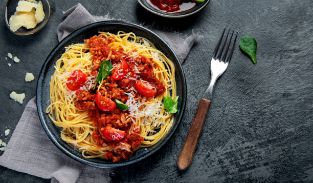 istock Spaghetti Bolognese on gray background. 1364327530