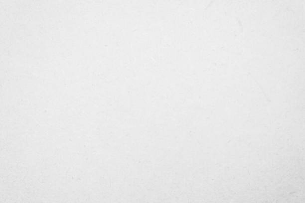 istock White recycled craft paper texture as background. Grey paper texture, Old vintage page or grunge vignette of old cardboard. Pattern rough art creased grunge letter. Hardboard with copy space for text. 1364327536