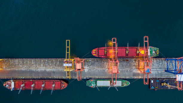 istock Aerial view bulk carrier dock, Global business import export logistic and transportation company, Commercial dock container cargo vessel freight shipping worldwide. 1364332609