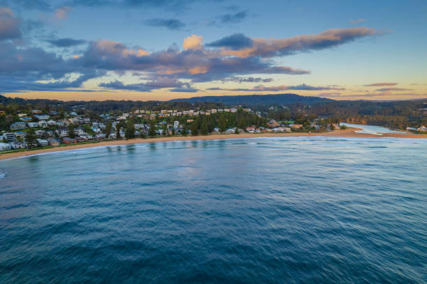 istock Aerial sunrise over the sea with clouds 1364332619