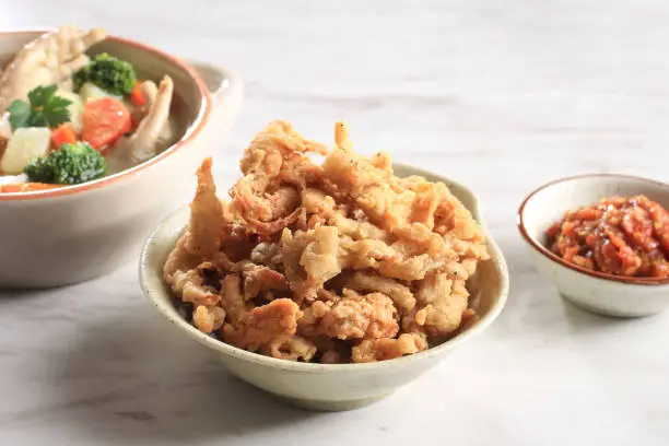 Photo of Crispy Fried Oyster Mushroom or Jamur Krispi. Oyster Mushroom Coated with Spiced Flour and Depp Fried.