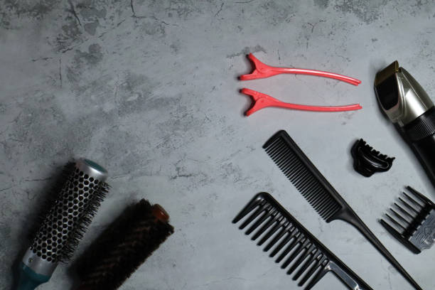 istock Professional tools for a barber shop on a gray background. 1364334742