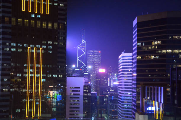 istock Hong Kong modern skyscrapers by night 1364338513