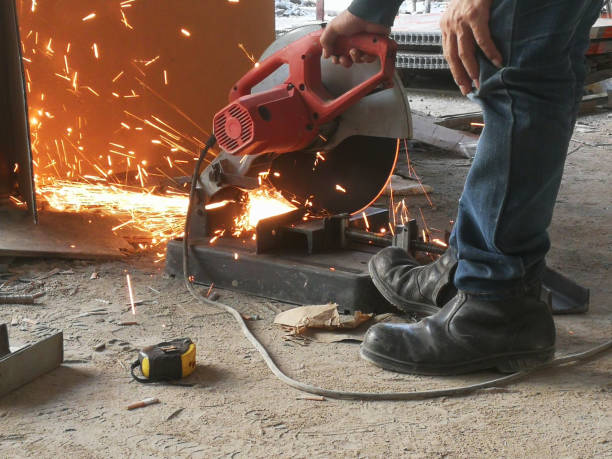 istock Steel grinding machine The technician is cutting steel in constuction site 1364338549