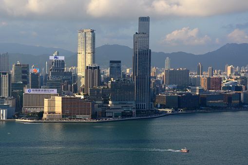 Kowloon skyline over Victoria Harbour, Hong Kong.