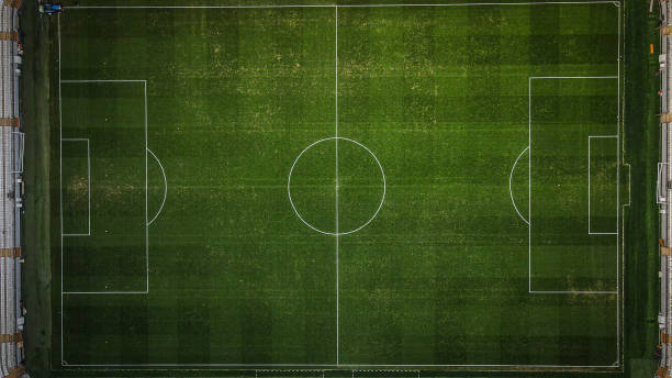 aerial view of football stadium, daytime soccer stadium, aerial view of overcapacity stadium, empty grandstand, empty football stadium, stadium without fans aerial view of football stadium, daytime soccer stadium, aerial view of overcapacity stadium, empty grandstand, empty football stadium, stadium without fans sports training camp stock pictures, royalty-free photos & images