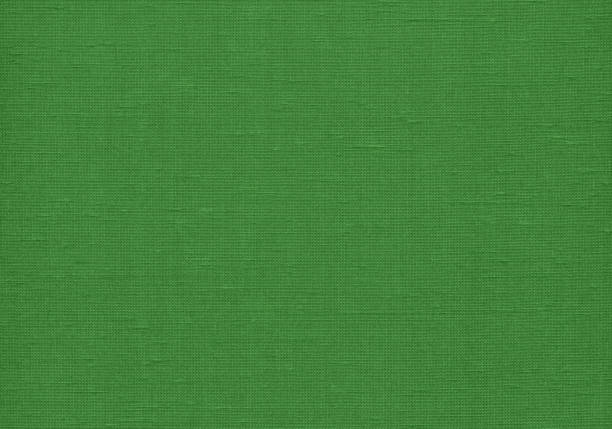 istock Textured green color fabric texture for background 1364346353