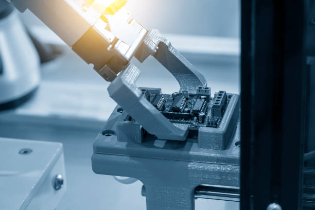 istock The hi-technology  material handling circuit board on the production line by robotic system. 1364348717