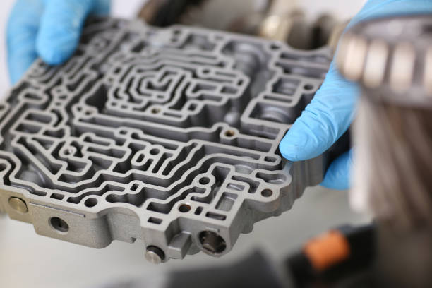 istock Auto repair service repairman in automatic closeup 1364354658