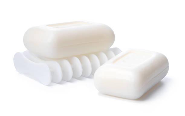 istock Soap on a plastic soap dish isolated on a white background 1364359835