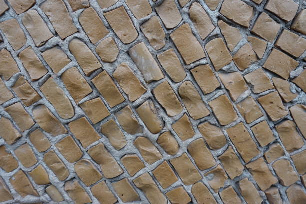 istock Texture of brown mosaic on the wall 1364360012