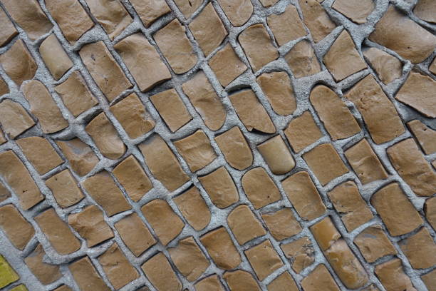 istock Surface of brown mosaic on the wall (front view) 1364360016