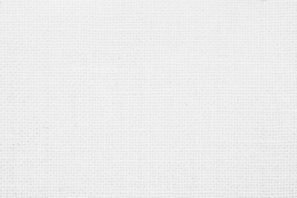 istock White fabric jute hessian sackcloth canvas woven gauze texture pattern in light white color blank. Natural linen and cotton cloth texture as clean background empty for decoration. 1364360857