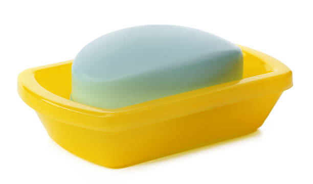 istock Soap on a plastic soap dish isolated on a white background 1364361477