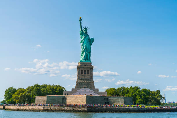istock The statue of Liberty  with blue sky background. 1364361770