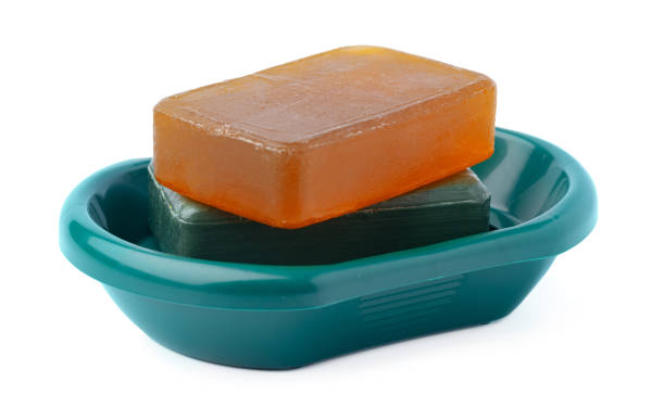 Soap on a plastic soap dish isolated on a white background
