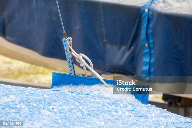 Stag Tensioner And Tarpaulin With Hail Stock Photo - Download Image Now - Adjusting, Close-up, Cold Temperature