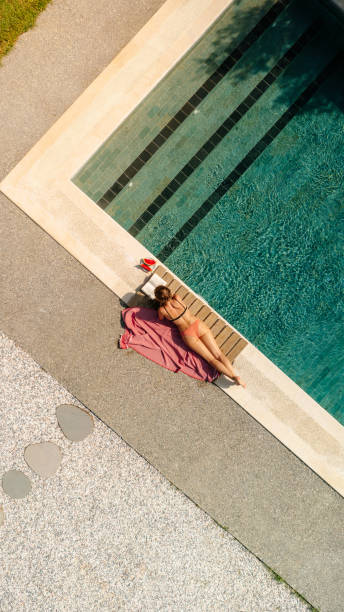 istock Idyllic moments  by the pool 1364369846
