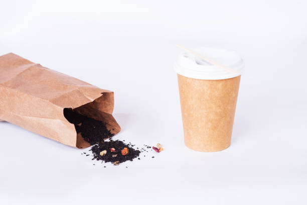 istock coffee cup of reusable materials with black tea in an organic bag on white background. zero waste concept 1364370097