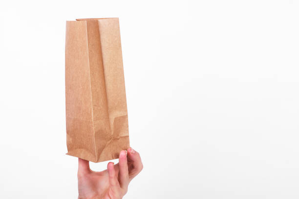 istock paper organic bag of reusable materials on white background. zero waste concept. replacement for plastic cups 1364370149