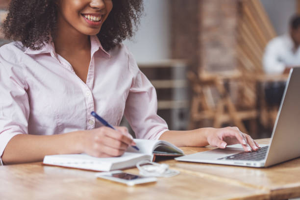istock Beautiful Afro-American woman working 1364370901