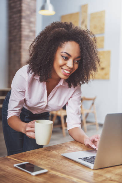 istock Beautiful Afro-American woman working 1364371196