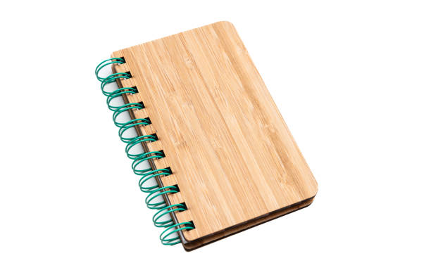 istock Spiral notepad isolated on white background. Blank hardcover notebook, wooden cover binder pad 1364372234