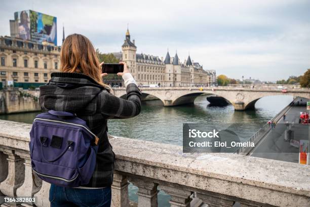 Tourist Woman Taking Photo In Paris Stock Photo - Download Image Now - Paris - France, Tourist, Tourism