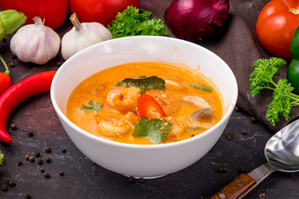 istock Tom Yam soup with shrimps on white bowl on dark table 1364382876