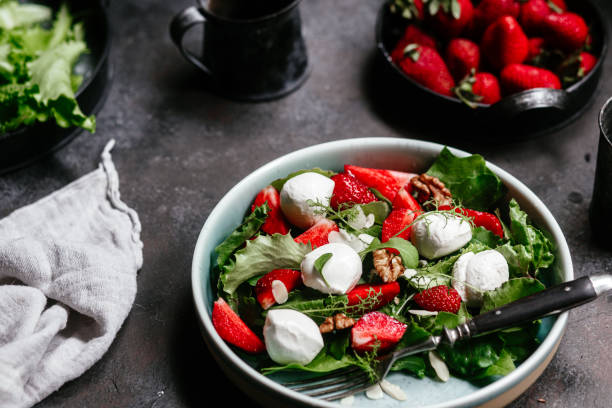 istock Salad with strawberries, mozzarella and arugula 1364384486
