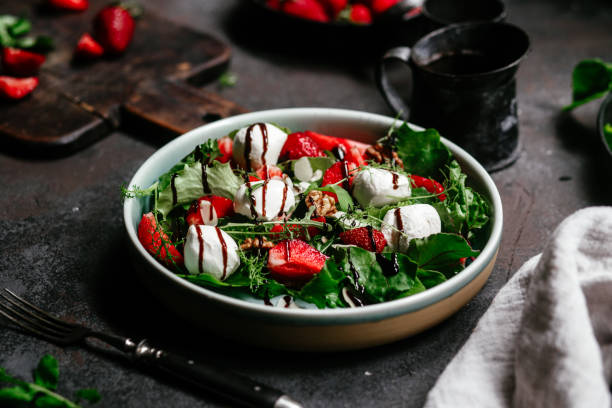 istock Salad with strawberries, mozzarella and arugula 1364384506