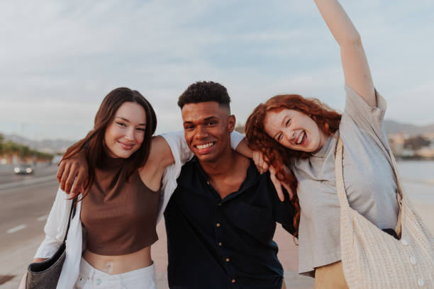 istock Diverse friends having a good time together in the waterfront 1364387610