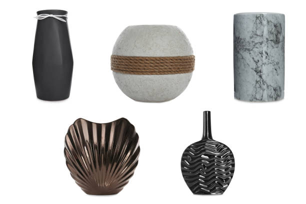 Set of beautiful ceramic vases on white background