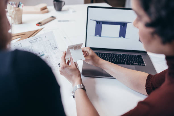 istock An Unrecognizable Man and Woman Sitting And Working Together 1364393654